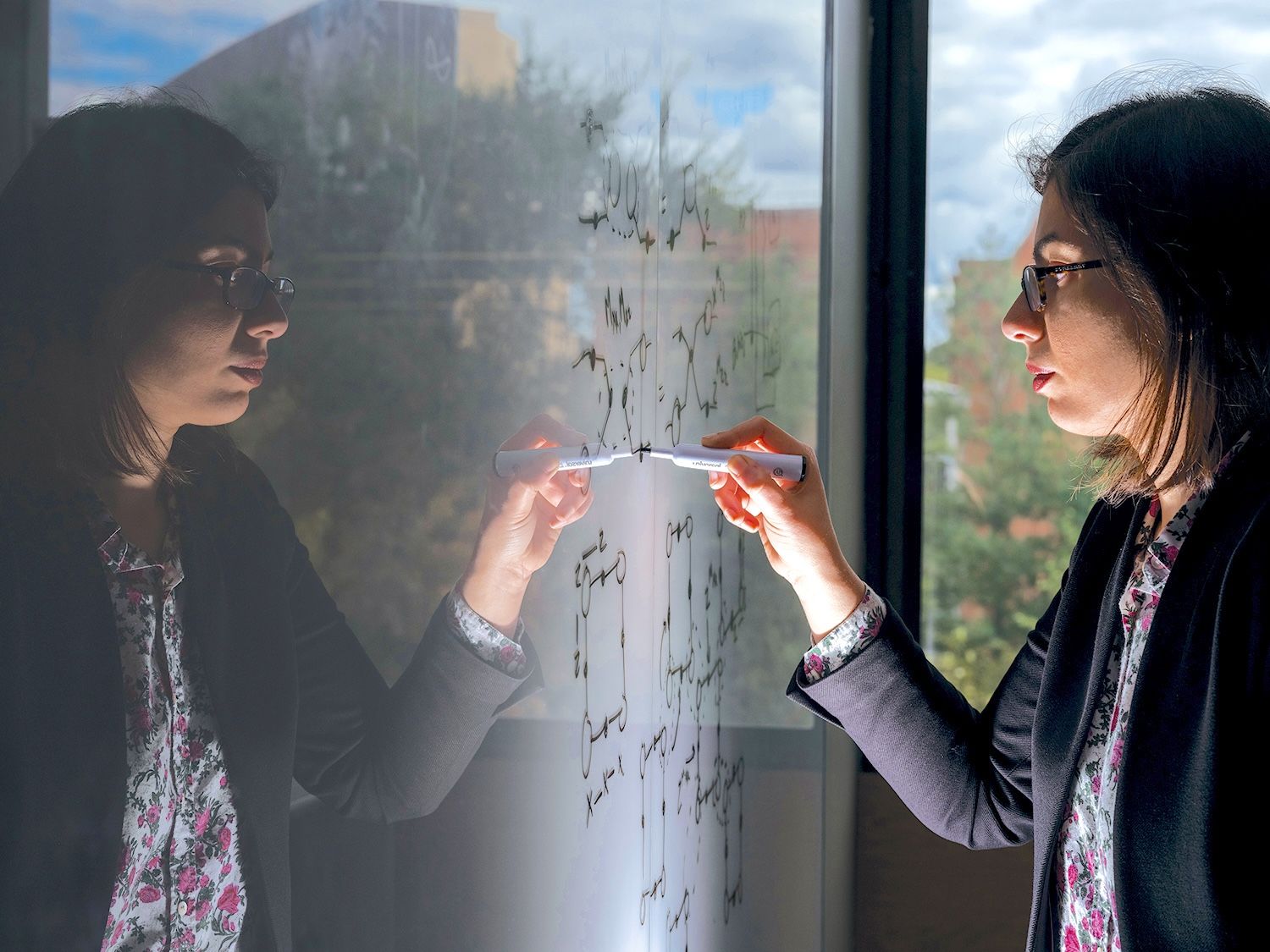 Shruti Puri’s research is at the intersection of quantum optics — that is, how light interacts with matter — and quantum information theory.